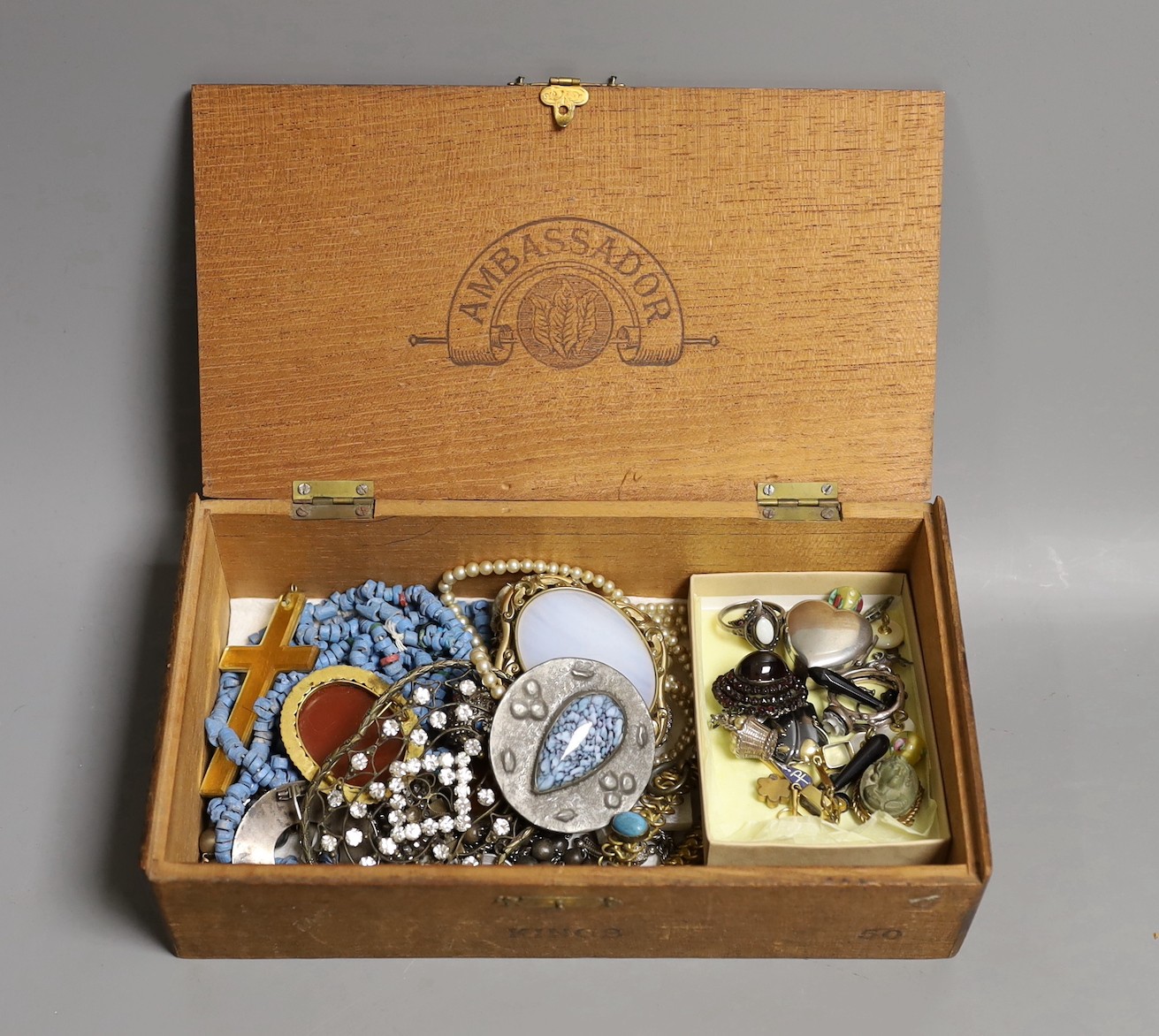 A quantity of Victorian and later jewellery including a garnet brooch, lava pendant, micro mosaics, opal inset silver ring etc.